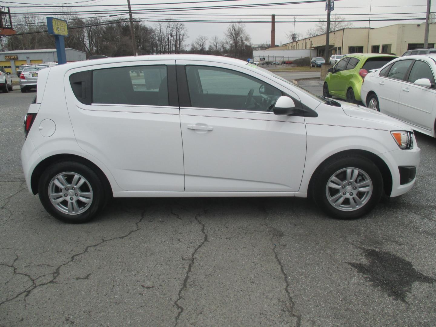 2015 WHITE Chevrolet Sonic LT Auto 5-Door (1G1JC6SH7F4) with an 1.8L L4 DOHC 24V engine, 6-Speed Automatic transmission, located at 1254 Manheim Pike, Lancaster, PA, 17601, (717) 393-9133, 40.062870, -76.323273 - Photo#3